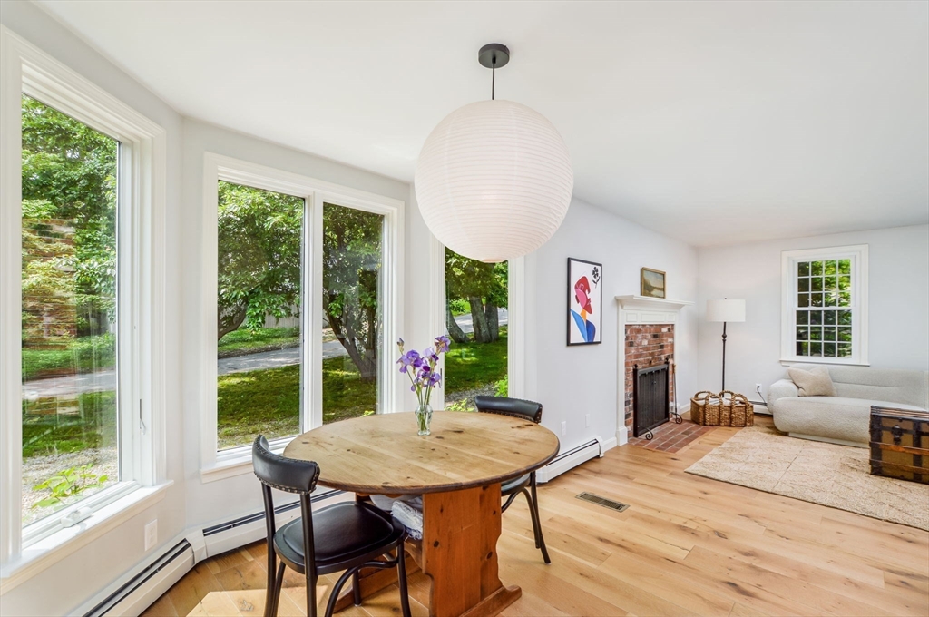 44 Buccaneer Way Mashpee, MA 02649 - Photo 15 of 39 a view of a dining room with furniture window and outside view