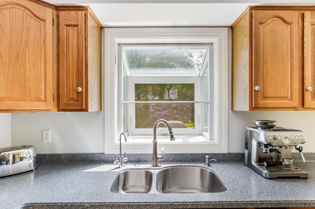 44 Buccaneer Way Mashpee, MA 02649 - Photo 19 of 39 a kitchen with a sink and a window