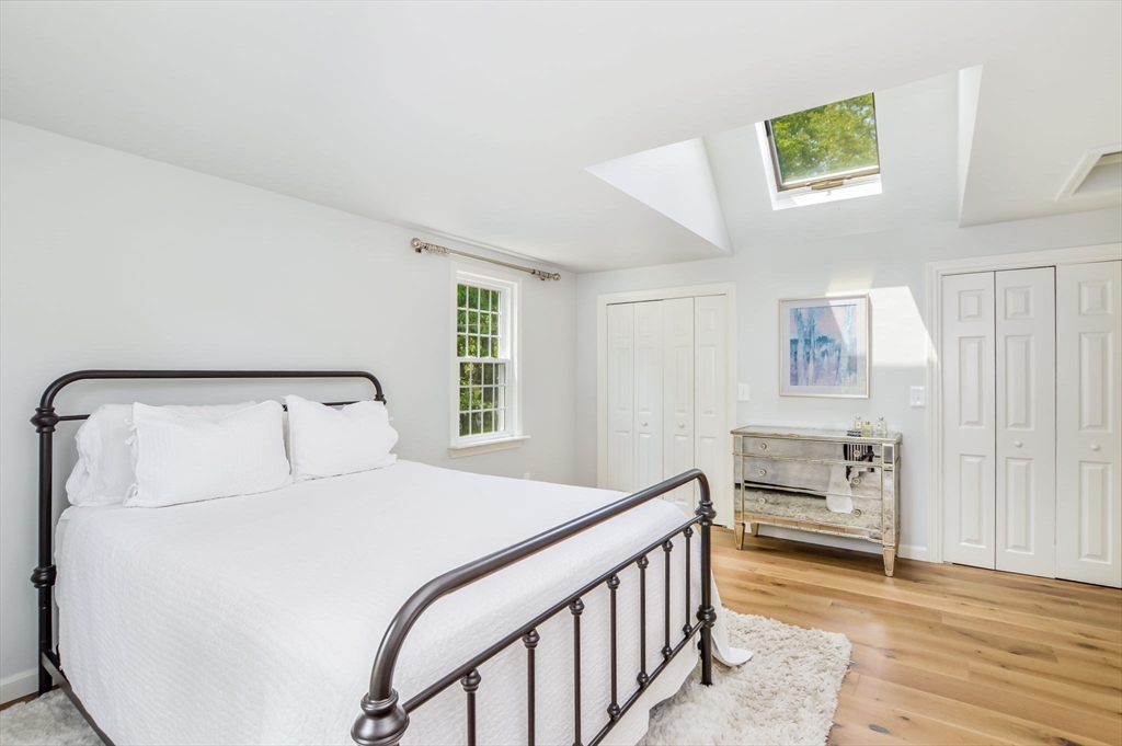 44 Buccaneer Way Mashpee, MA 02649 - Photo 23 of 39 a bedroom with a bed and a window