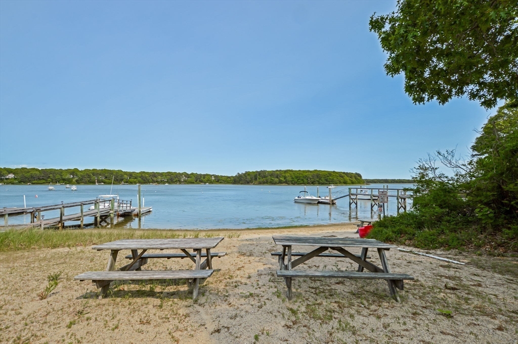 44 Buccaneer Way Mashpee, MA 02649 - Photo 33 of 39 a view of a lake with outdoor space