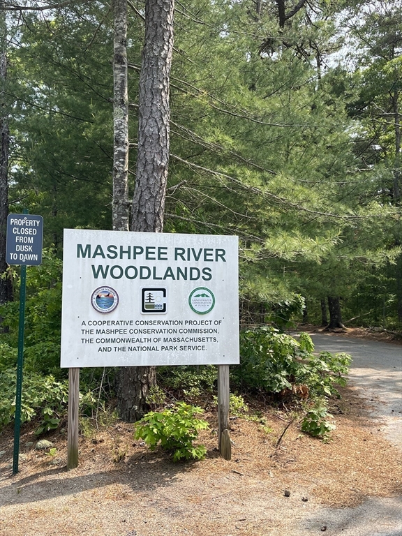 44 Buccaneer Way Mashpee, MA 02649 - Photo 39 of 39 a sign on the side of a building