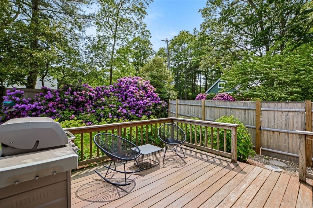 44 Buccaneer Way Mashpee, MA 02649 - Photo 9 of 39 a view of a chairs on the roof deck