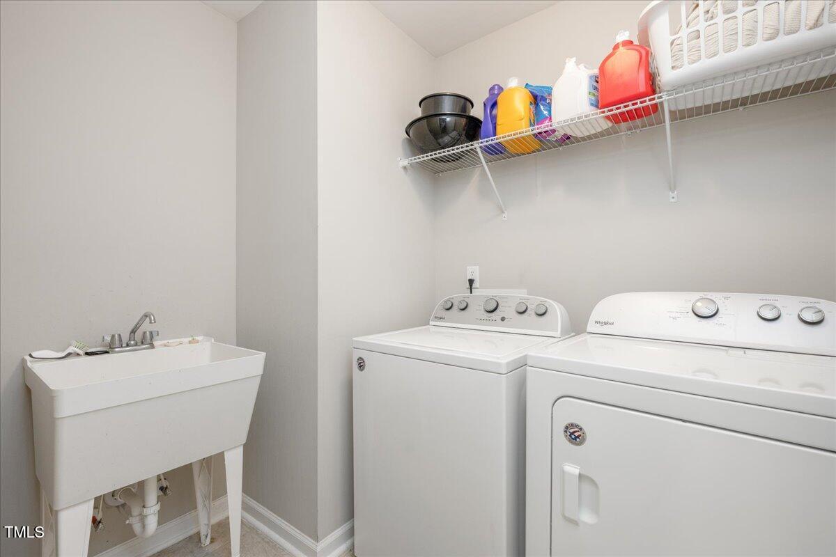 1416 Southpoint Trail Durham, NC 27713 - Photo 22 of 26 a utility room with dryer and washer