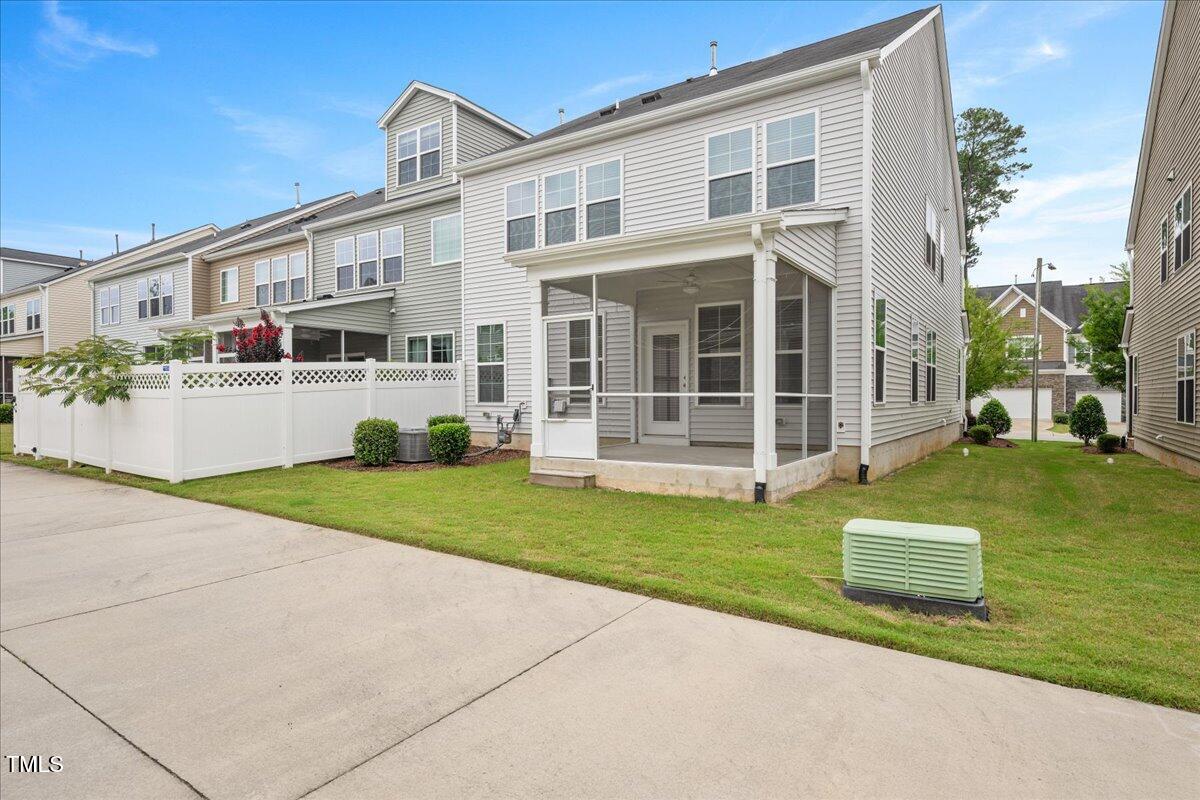 1416 Southpoint Trail Durham, NC 27713 - Photo 24 of 26 a front view of a house with a yard