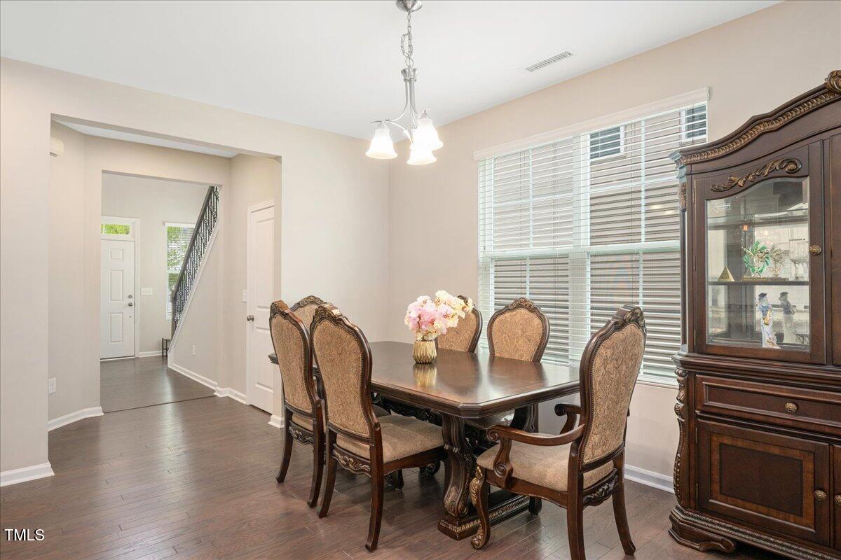 1416 Southpoint Trail Durham, NC 27713 - Photo 4 of 26 a dining room with furniture and window
