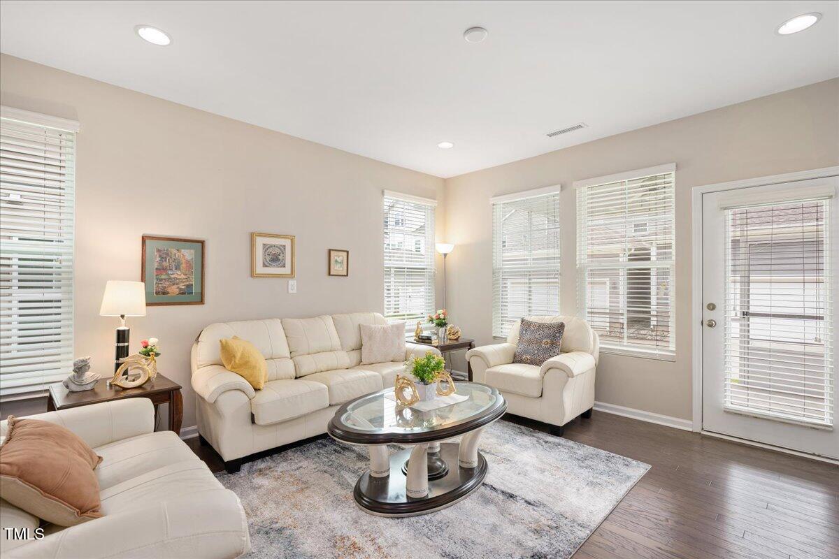 1416 Southpoint Trail Durham, NC 27713 - Photo 8 of 26 a living room with furniture and a large window