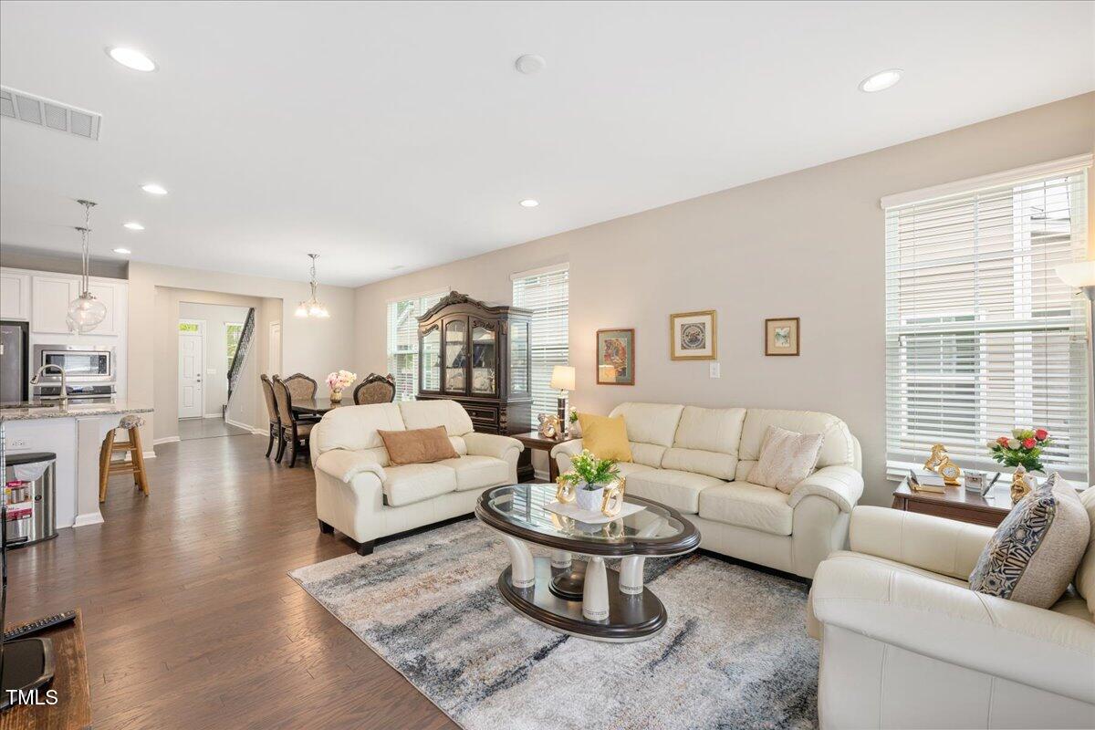 1416 Southpoint Trail Durham, NC 27713 - Photo 10 of 26 a living room with furniture and a large window