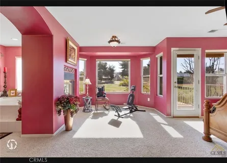 a view of a living room and a window