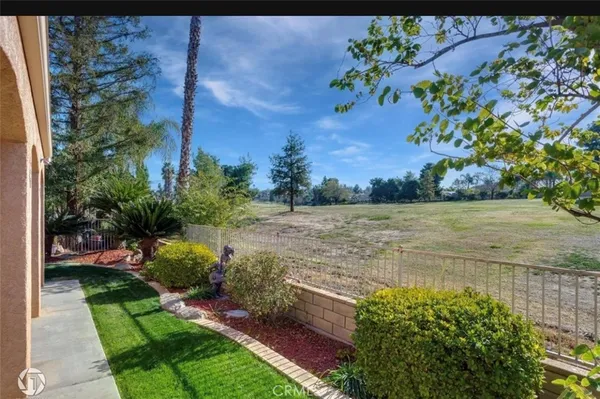 a view of a lake with a yard