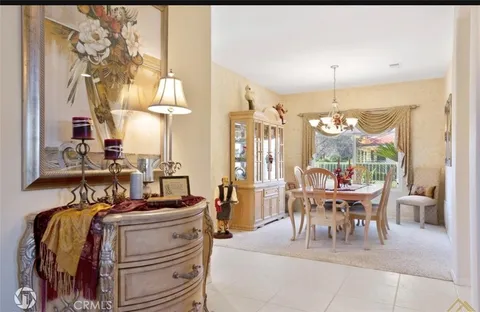 a room with gym equipment and a large window