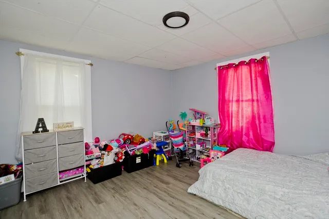 a bedroom with furniture and a bed