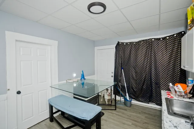a view of a livingroom with furniture and wooden floor