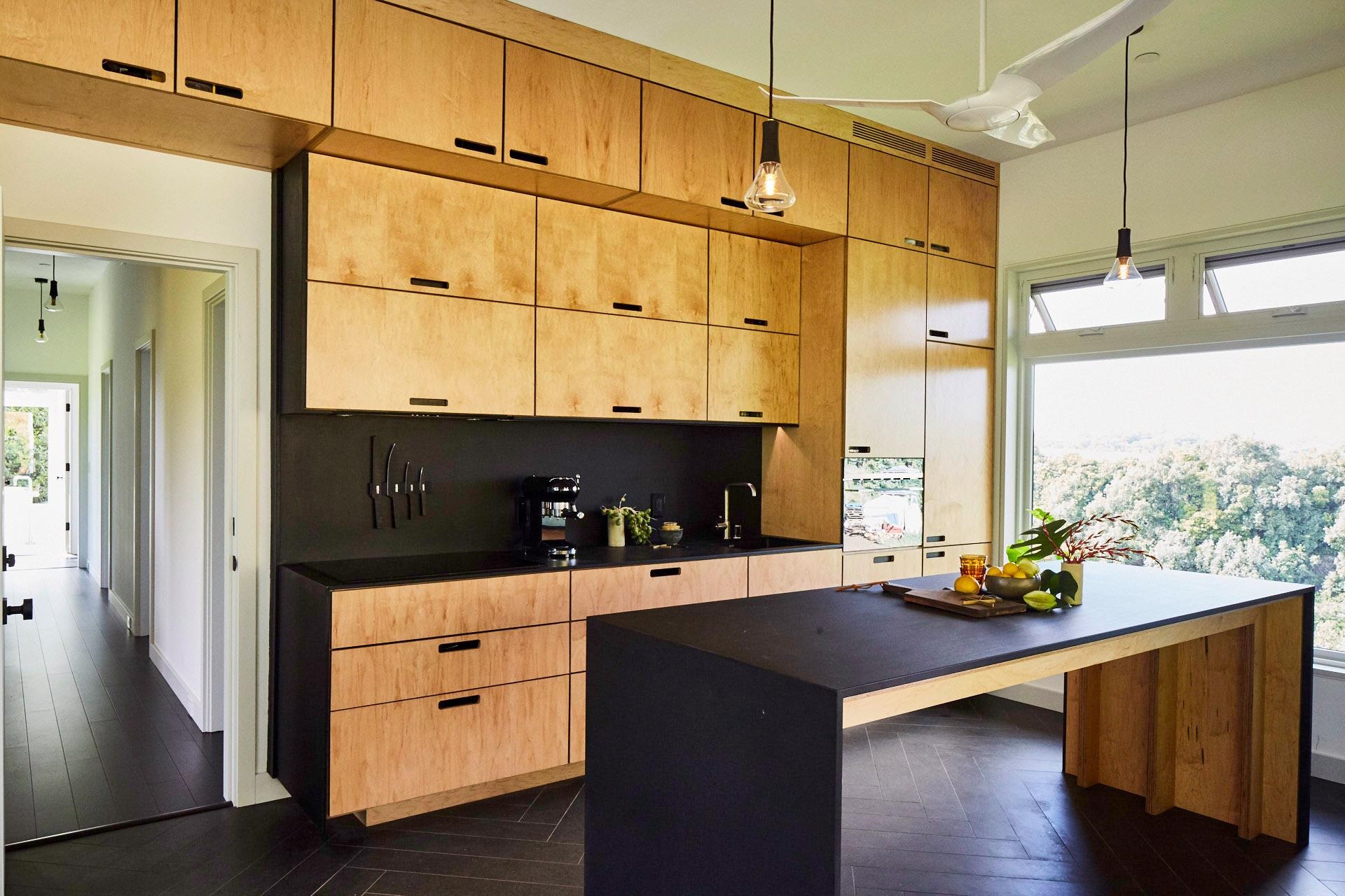 3127 Ua Noe Place, Unit B Haiku, HI 96708 - Photo 9 of 50 a kitchen with stainless steel appliances a sink window and cabinets