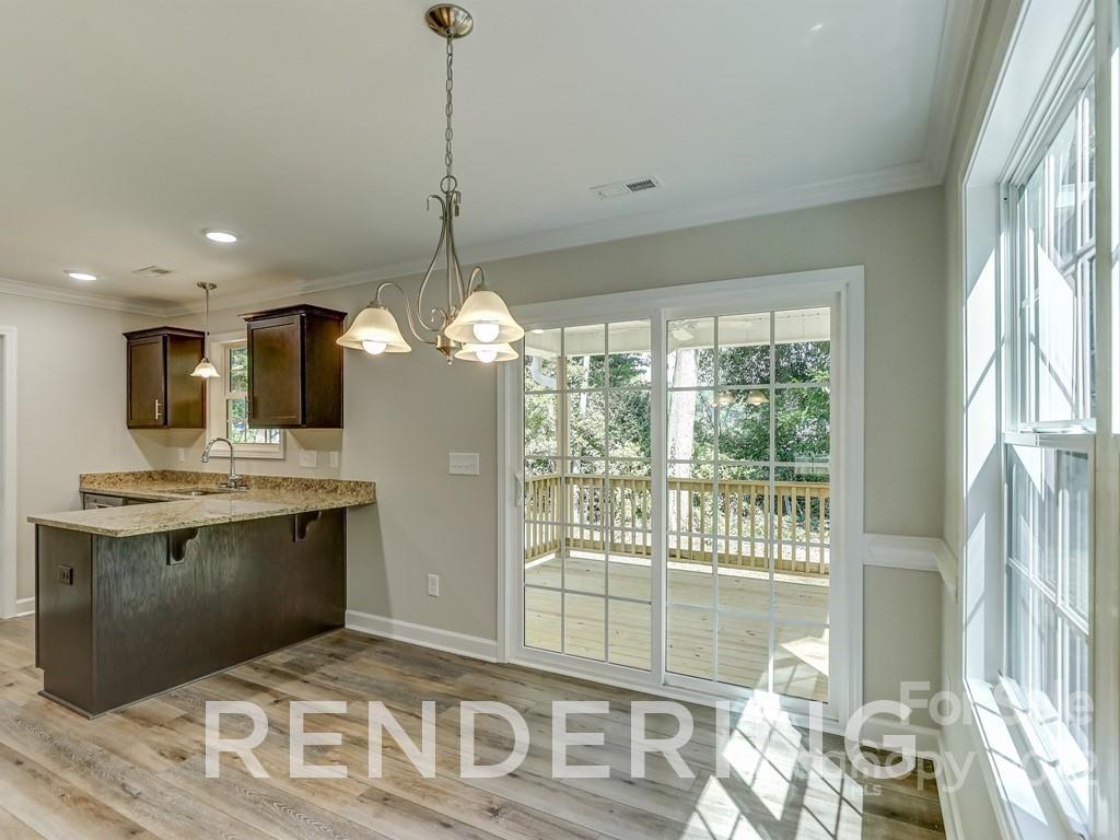 188 Washington Street York, SC 29745 - Photo 13 of 46 a view of a kitchen with stainless steel appliances granite countertop a stove and a sink
