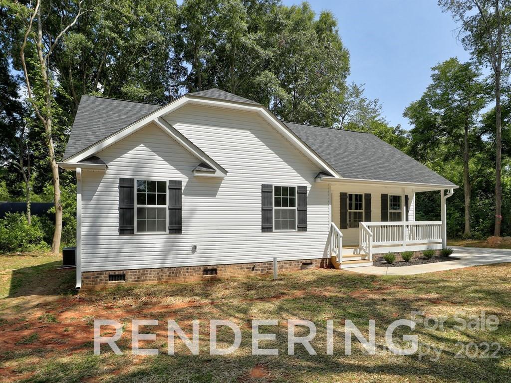 188 Washington Street York, SC 29745 - Photo 2 of 46 a front view of a house with a yard