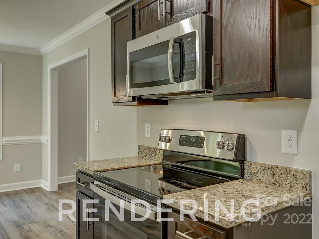 188 Washington Street York, SC 29745 - Photo 22 of 46 a stove top oven sitting inside of a kitchen