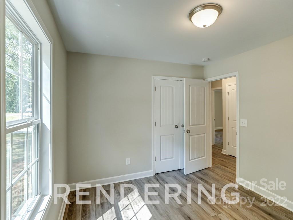 188 Washington Street York, SC 29745 - Photo 28 of 46 a view of room with window and wooden floor