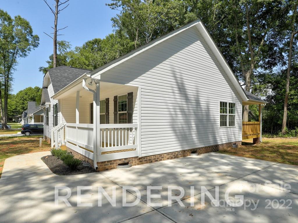 188 Washington Street York, SC 29745 - Photo 3 of 46 a view of a house with a yard