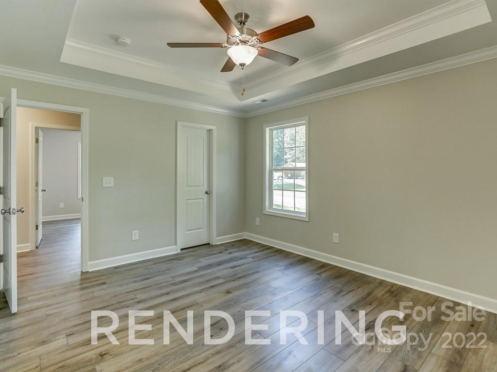 188 Washington Street York, SC 29745 - Photo 38 of 46 wooden floor in an empty room with a window