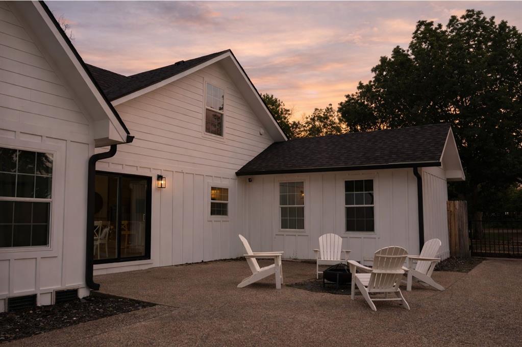 3210 Edna Avenue Waco, TX 76708 - Photo 16 of 18 a backyard of a house with table and chairs