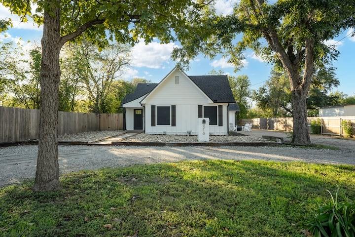 3210 Edna Avenue Waco, TX 76708 - Photo 2 of 18 a view of a yard with a house and a large tree