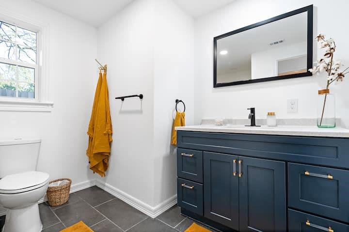 3210 Edna Avenue Waco, TX 76708 - Photo 9 of 18 a bathroom with a toilet sink and mirror