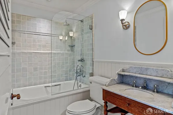 a view of a livingroom with furniture window and wooden floor
