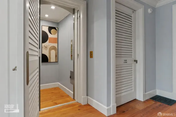 a kitchen with a sink a counter space and a window