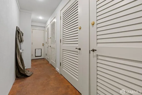 a spacious bathroom with a granite countertop sink mirror and shower