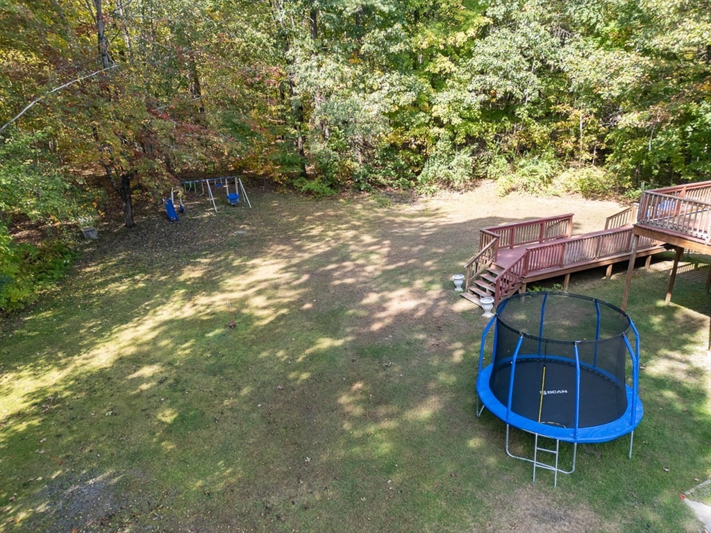 55 Gilchrist Road Townsend, MA 01469 - Photo 36 of 42 a view of a backyard of a house