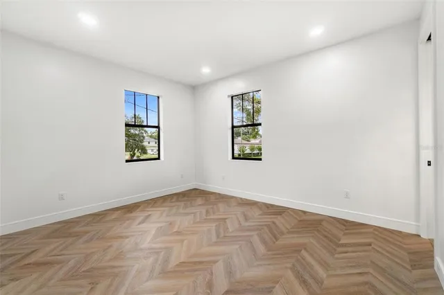 an empty room with windows