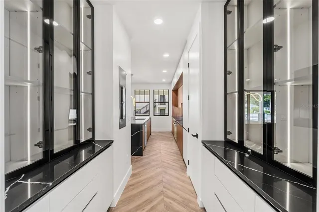 a view of a living room with a large window