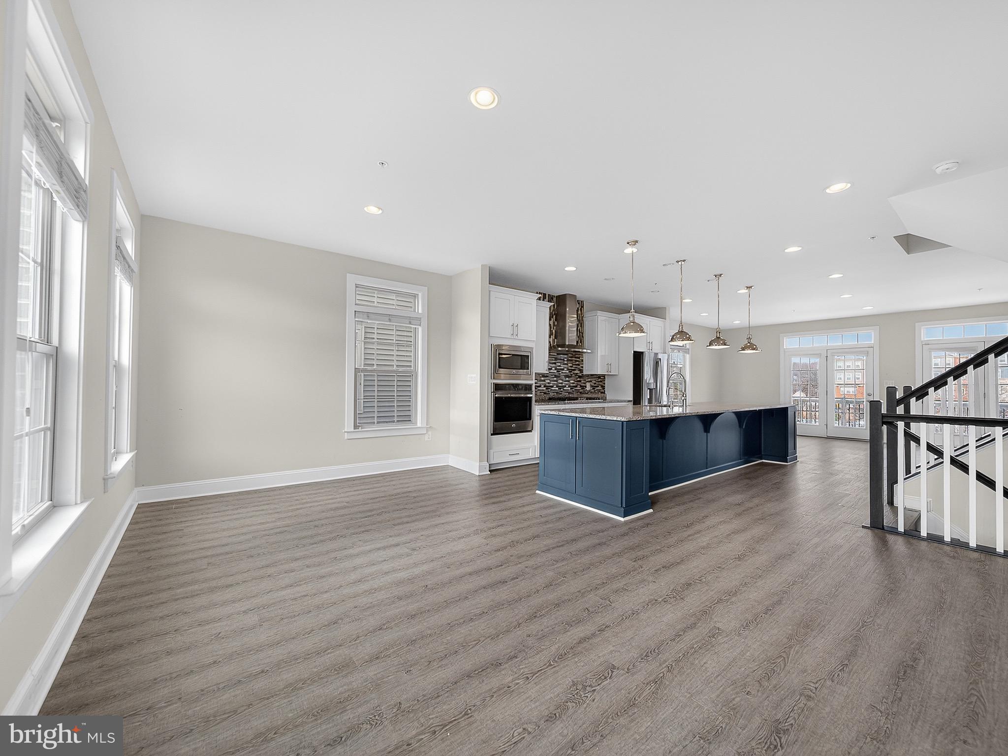 2914 Middleham Court Hanover, MD 21076 - Photo 17 of 50 a view of kitchen with wooden floor and windows