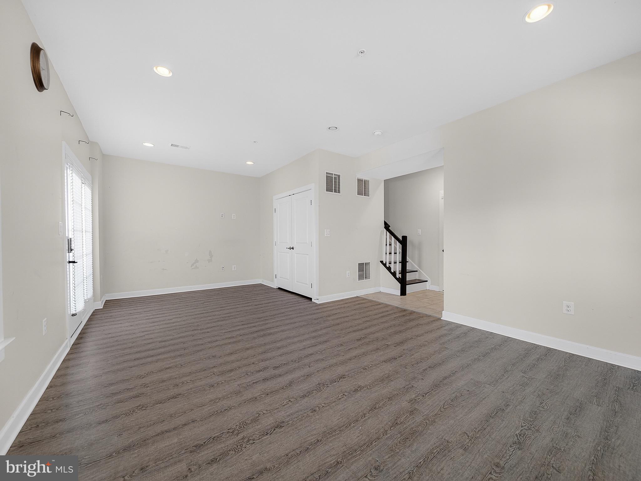 2914 Middleham Court Hanover, MD 21076 - Photo 37 of 50 a view of empty room with wooden floor and fan