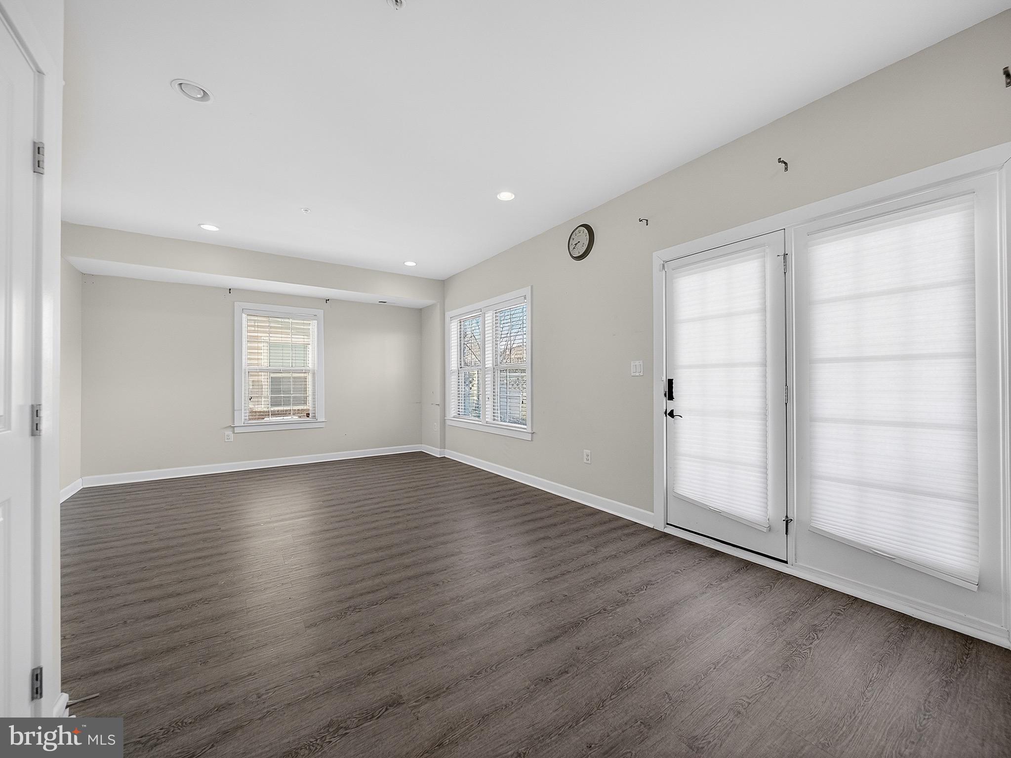 2914 Middleham Court Hanover, MD 21076 - Photo 39 of 50 an empty room with wooden floor and window
