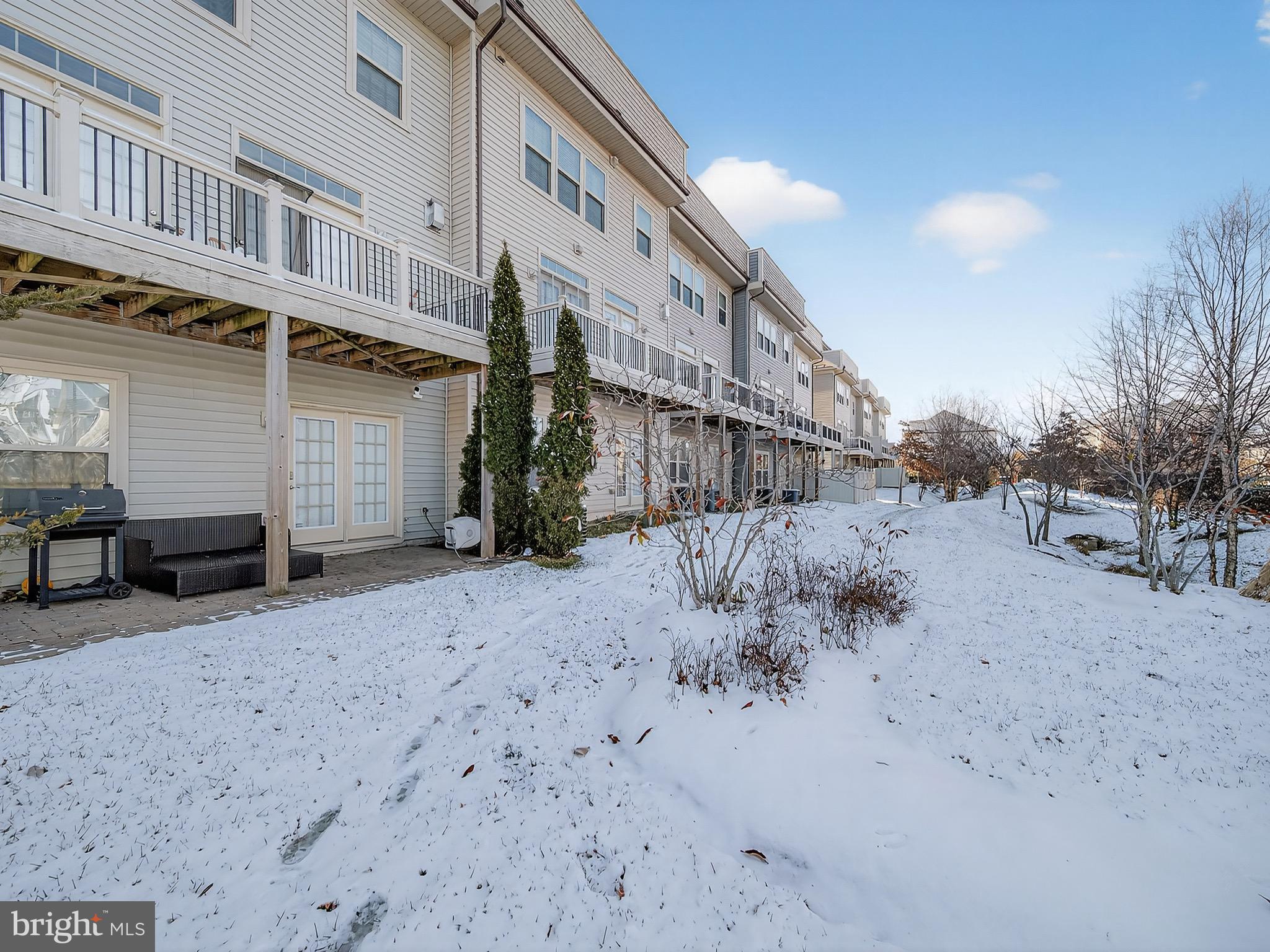 2914 Middleham Court Hanover, MD 21076 - Photo 45 of 50 a view of a house with a snow in the yard
