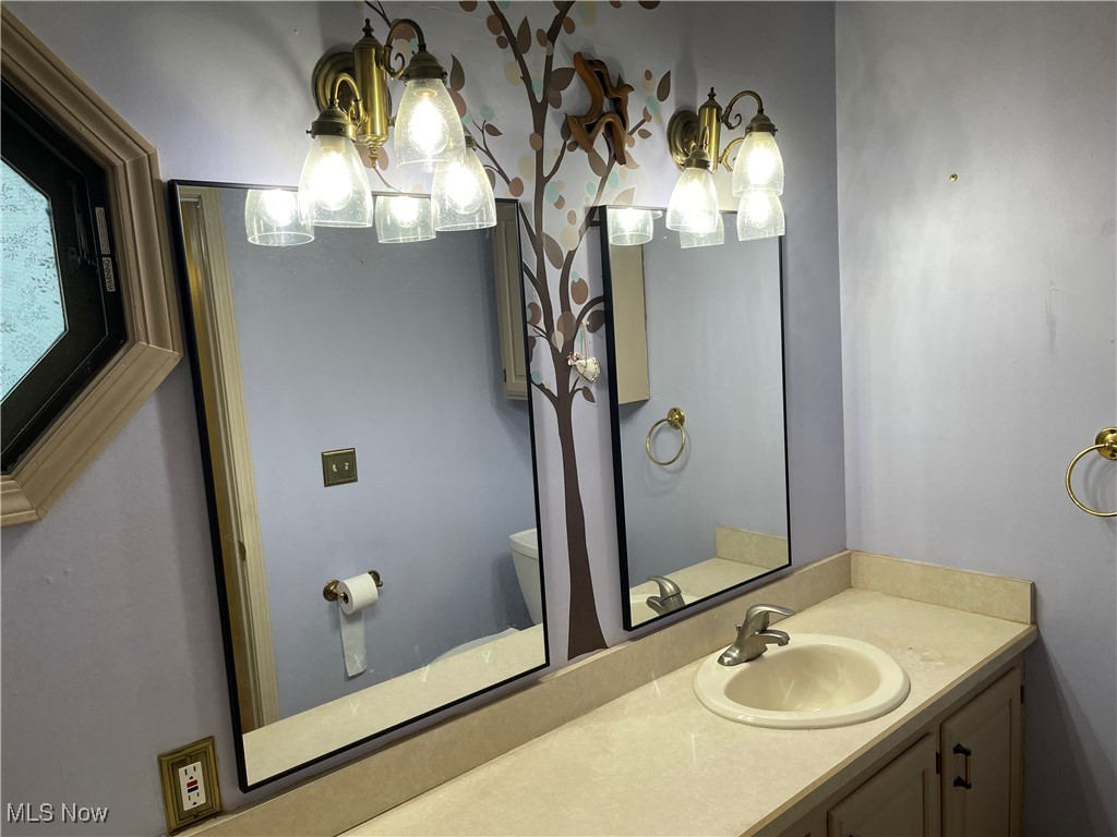 170 Burns Road Elyria, OH 44035 - Photo 13 of 32 Bathroom featuring vanity and toilet