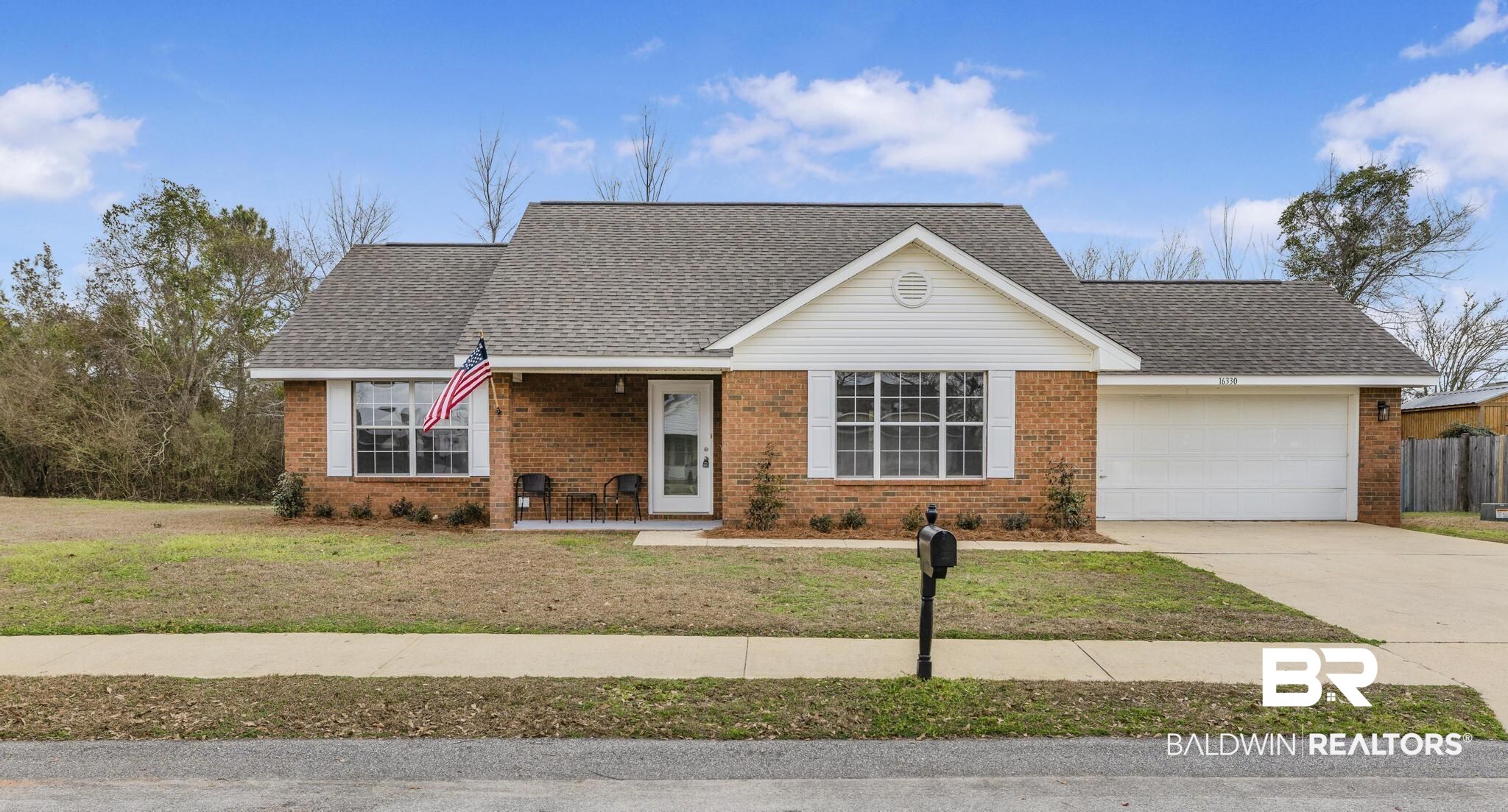 16330 Absalom Street Foley, AL 36535 - Photo 1 of 42 Ranch-style house with a garage and a front lawn