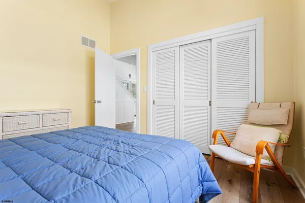 a bedroom with a bed and furniture