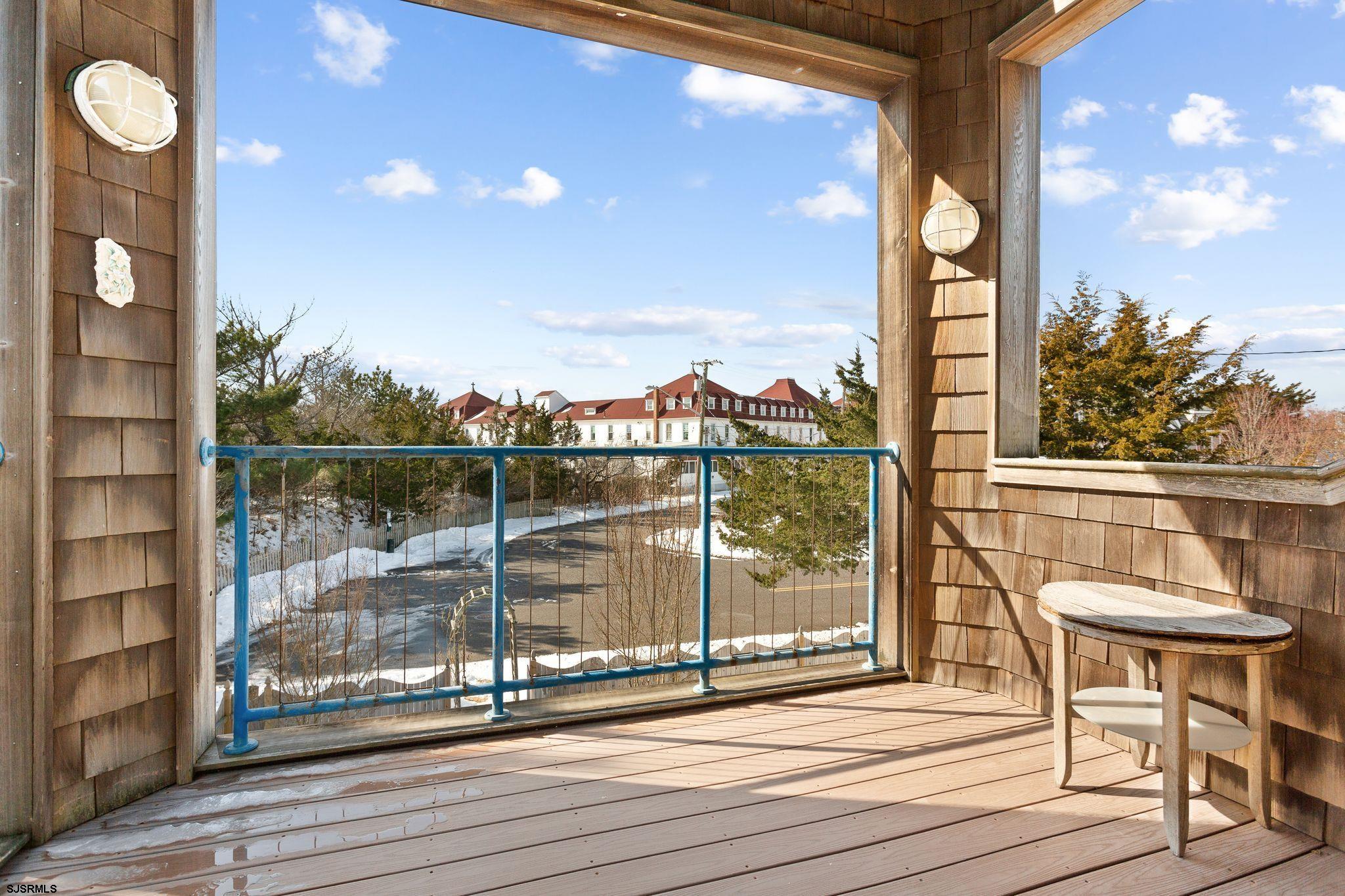 701 Lighthouse Road Cape May Point, NJ 08212 - Photo 19 of 32 a view of a balcony with chairs