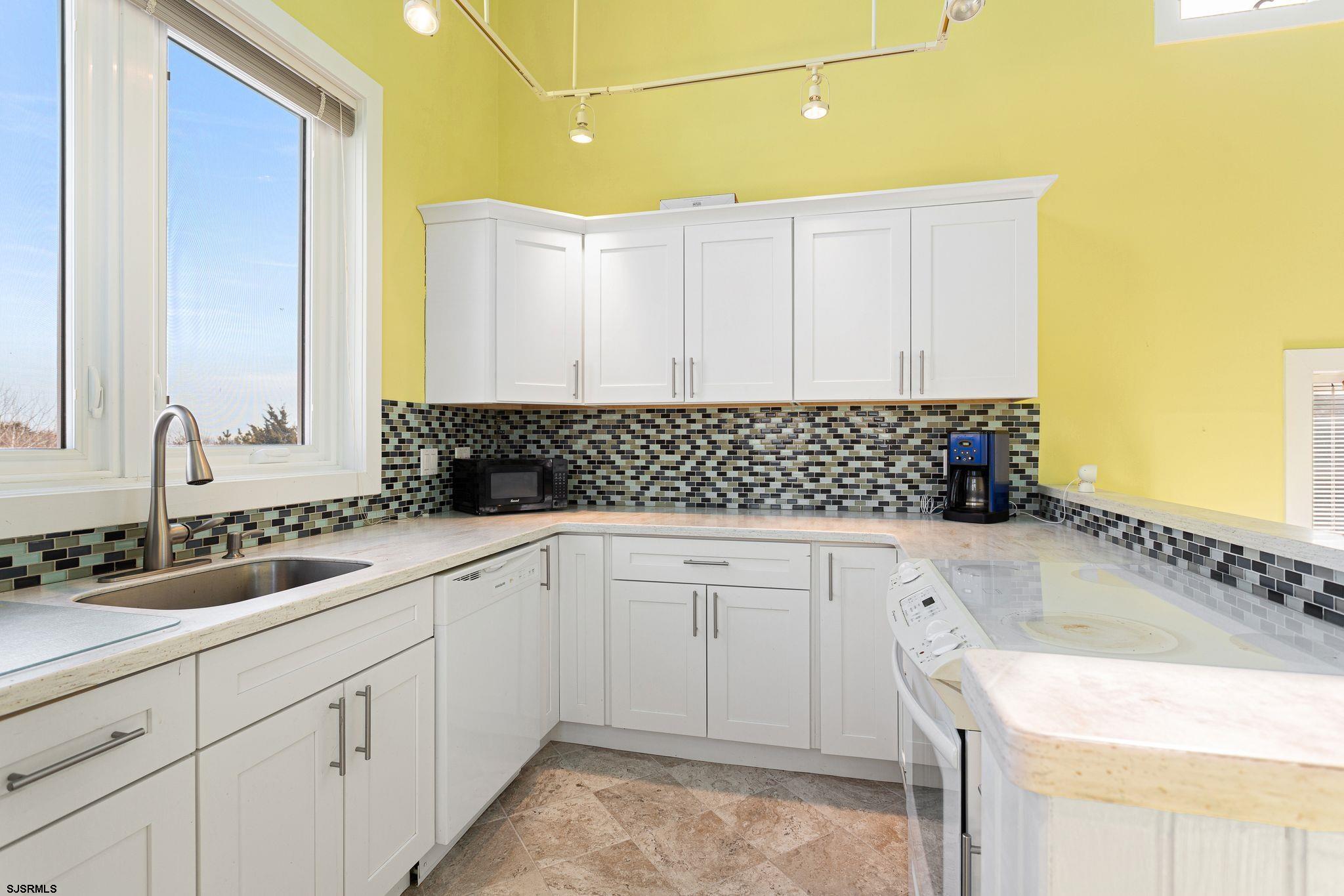 701 Lighthouse Road Cape May Point, NJ 08212 - Photo 23 of 32 a bathroom with a sink and a bathtub