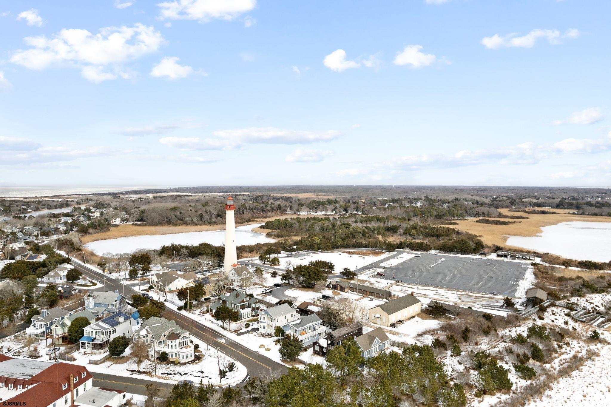 701 Lighthouse Road Cape May Point, NJ 08212 - Photo 30 of 32 an aerial view of residential building and ocean view