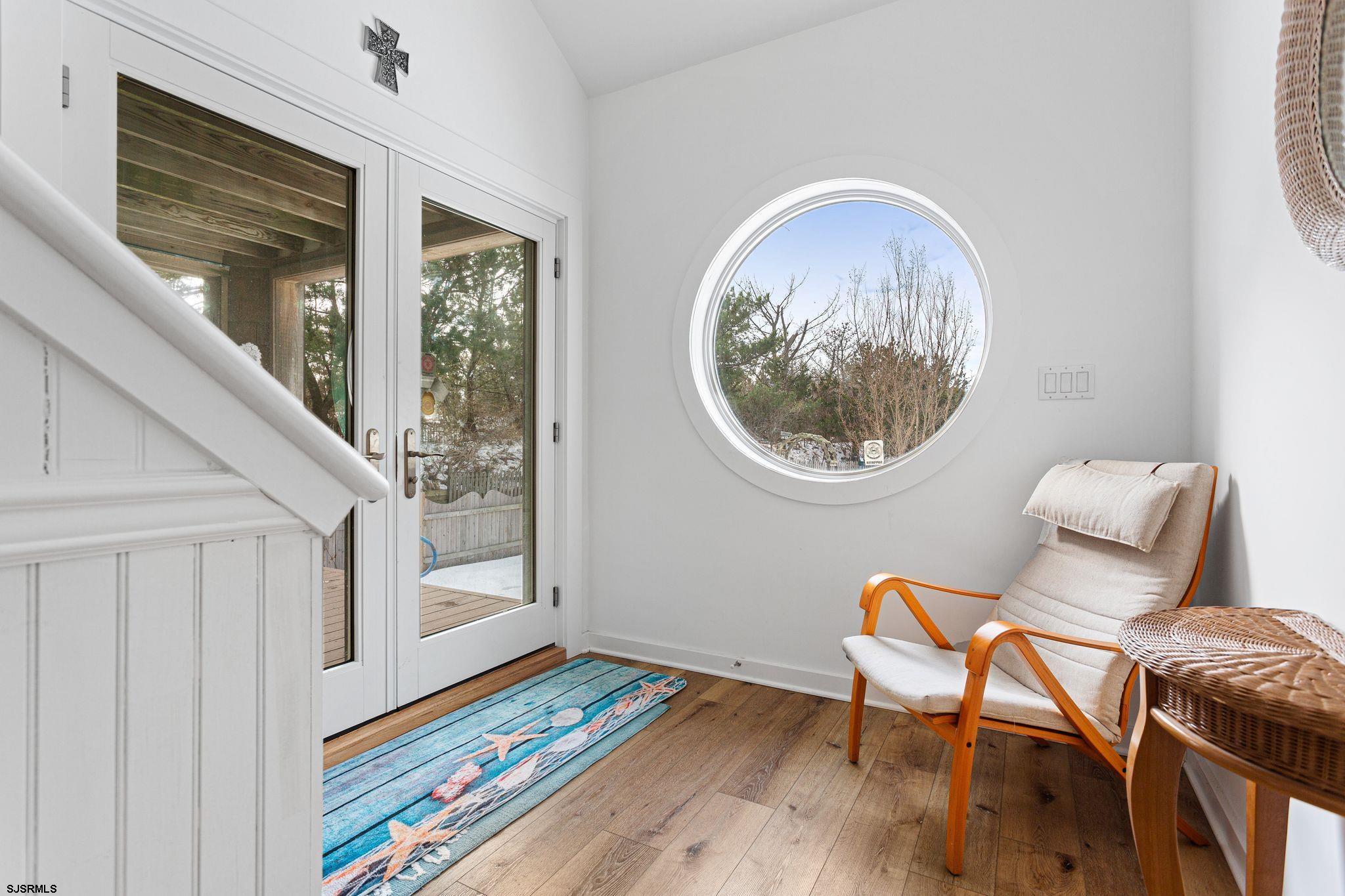 701 Lighthouse Road Cape May Point, NJ 08212 - Photo 4 of 32 a workspace with furniture and a window