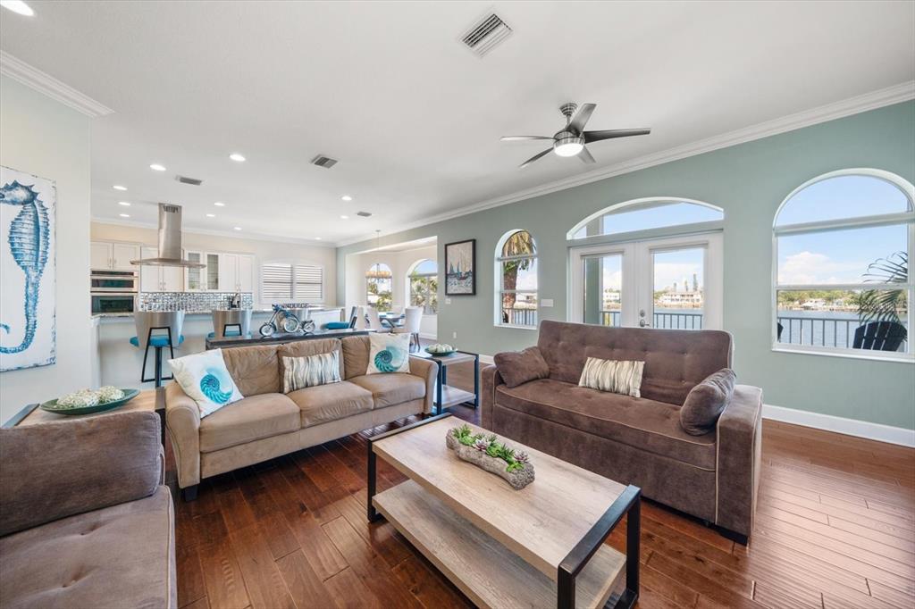 478 Harbor Drive South Indian Rocks Beach, FL 33785 - Photo 13 of 68 a living room with furniture kitchen and a wooden floor