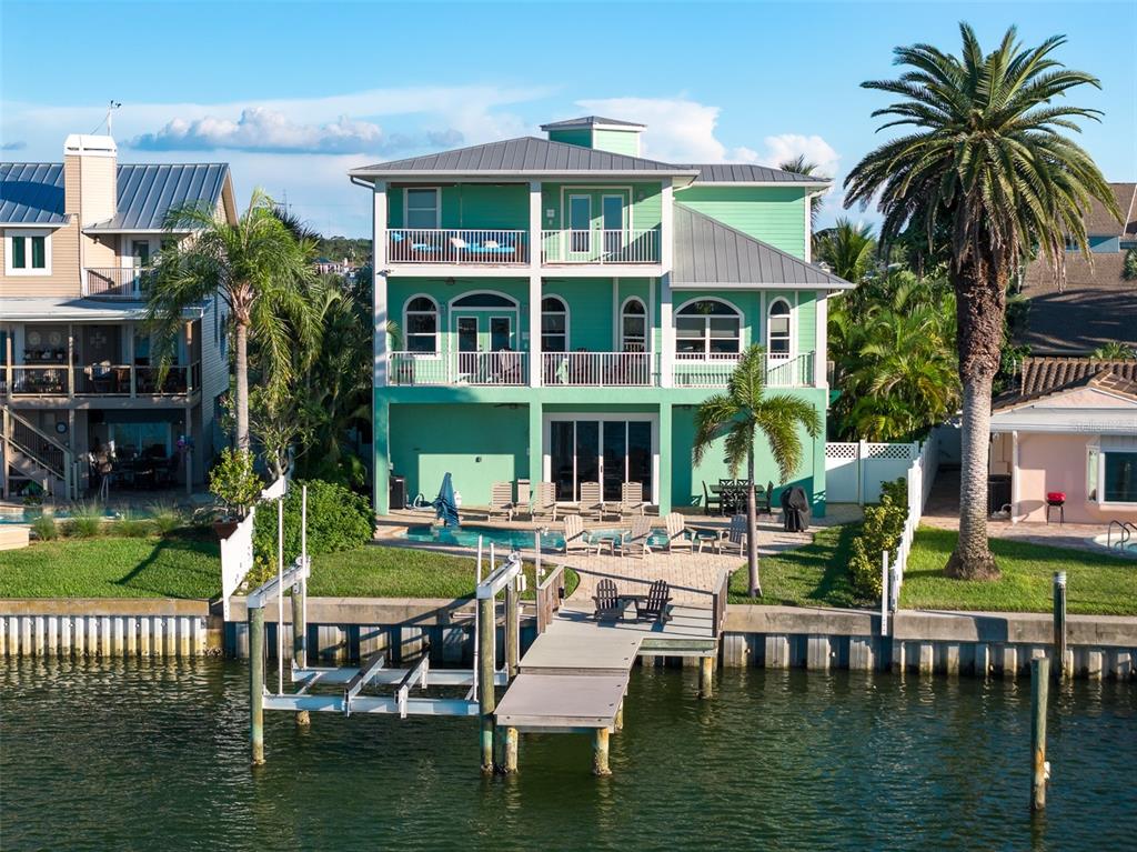 478 Harbor Drive South Indian Rocks Beach, FL 33785 - Photo 2 of 68 a swimming pool view with a seating space