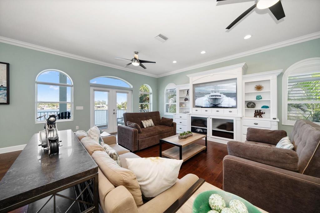 478 Harbor Drive South Indian Rocks Beach, FL 33785 - Photo 39 of 68 a living room with furniture fireplace and a large window
