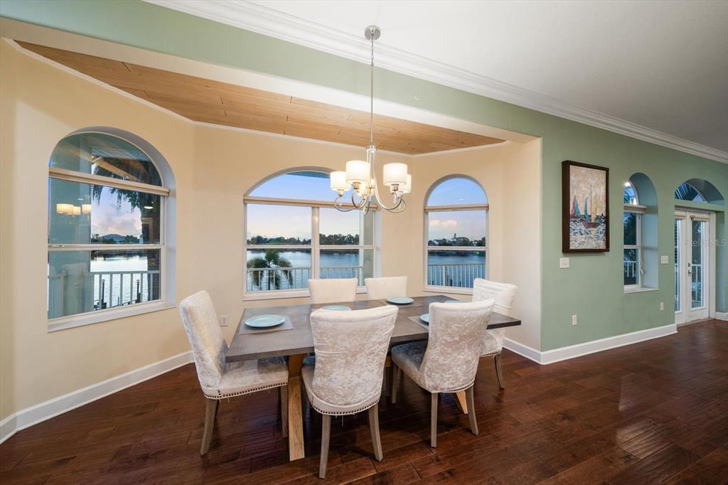 478 Harbor Drive South Indian Rocks Beach, FL 33785 - Photo 40 of 68 a view of a dining room with furniture window and wooden floor