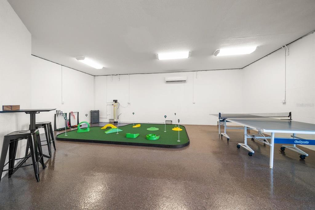 478 Harbor Drive South Indian Rocks Beach, FL 33785 - Photo 48 of 68 a living room with patio furniture and a wooden floor