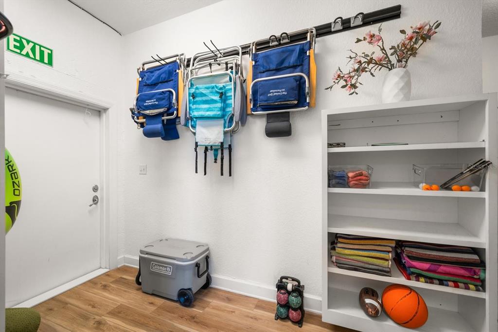 478 Harbor Drive South Indian Rocks Beach, FL 33785 - Photo 49 of 68 a view of walk in closet with clothes and shoes