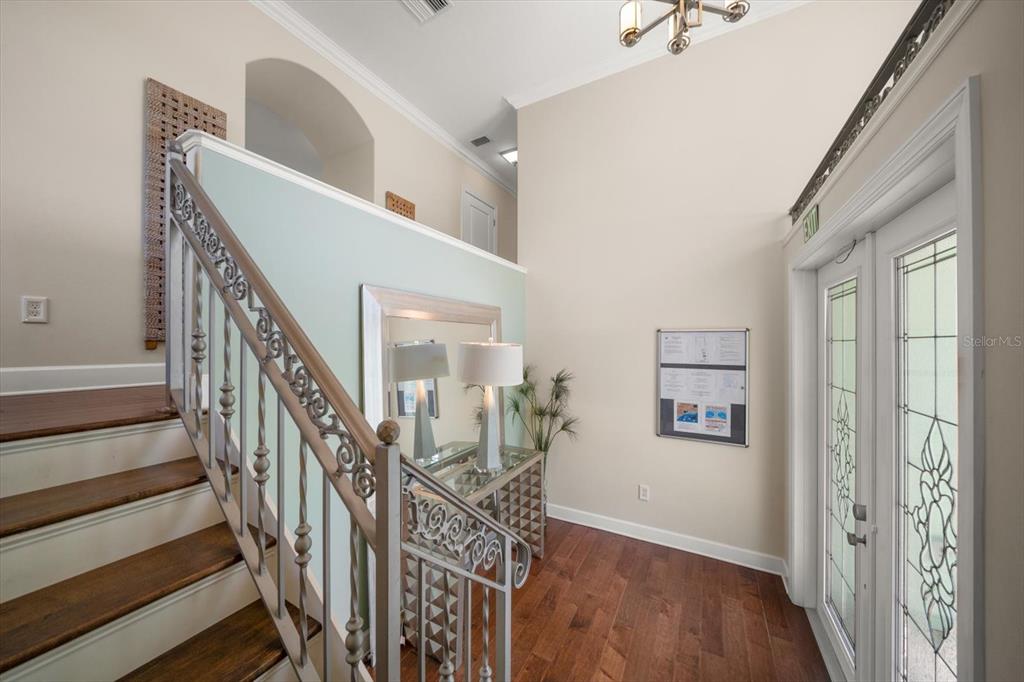 478 Harbor Drive South Indian Rocks Beach, FL 33785 - Photo 6 of 68 a view of entryway and hall with wooden floor